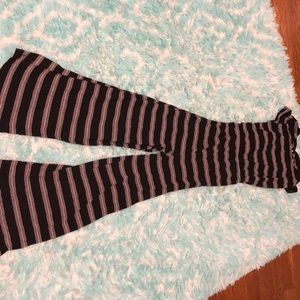 A black, white striped jumpsuit.